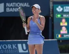 epa10121439 Simona Halep of Romania celebrates her victory against Beatriz Haddad Maia of Brazil during the final of the National Bank Open women's tennis tournament in Toronto, Canada, 15 August 2022. EPA/EDUARDO LIMA