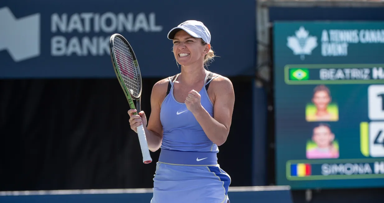 epa10121439 Simona Halep of Romania celebrates her victory against Beatriz Haddad Maia of Brazil during the final of the National Bank Open women's tennis tournament in Toronto, Canada, 15 August 2022. EPA/EDUARDO LIMA