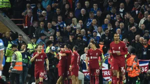 epa10223578 Trent Alexander-Arnold of Liverpool FC celebrates with team mates after scoring a goal during the UEFA Champions League group A soccer match between Liverpool FC and Rangers FC in Liverpool, Britain, 04 October 2022. EPA/Peter Powell