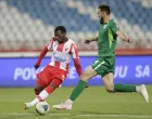 epa08579632 Red Star's Mohamed Ben El Fardou (L) in action against Novi Pazar's Numan Kurdic (R) during the Serbian SuperLiga soccer match between Red Star and Novi Pazar, in Belgrade, Serbia, 01 August 2020. The Serbian SuperLiga kicks off without spectators due to the coronavirus pandemic. EPA/ANDREJ CUKIC