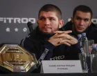 epa09640129 Former Russian mixed martial arts (MMA) fighter, UFC lightweight titleholder Khabib Nurmagomedov attends a press conference in Moscow, Russia, 13 December 2021. Nurmagomedov spoke about cooperation with the Fitroo brand and his team's plans for the coming year. EPA/YURI KOCHETKOV