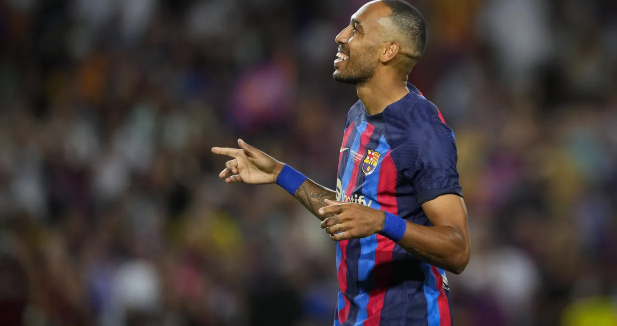 epa10110576 FC Barcelona's striker Pierre Emerick Aubameyang celebrates after scoring the 5-0 during the Joan Gamper trophy soccer match between FC Barcelona and Pumas UNAM at Camp Nou stadium in Barcelona, Catalonia, Spain, 07 August 2022. EPA/Alejandro Garcia