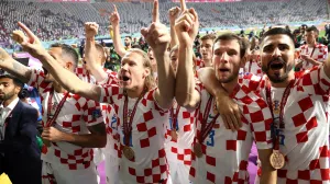 epa10370608 (from R) Martin Erlic, Borna Barisic, Domagoj Vida and Dejan Lovren of Croatia celebrate after the team won the FIFA World Cup 2022 third place soccer match between Croatia and Morocco at Khalifa International Stadium in Doha, Qatar, 17 December 2022. EPA/Tolga Bozoglu