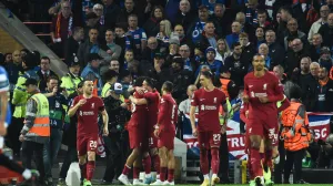 epa10223578 Trent Alexander-Arnold of Liverpool FC celebrates with team mates after scoring a goal during the UEFA Champions League group A soccer match between Liverpool FC and Rangers FC in Liverpool, Britain, 04 October 2022. EPA/Peter Powell