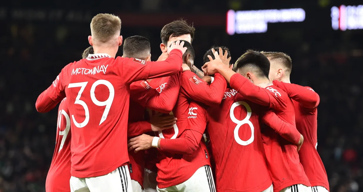 epa10393230 Manchester United's Marcus Rashford (C), assisted by his teammates, reacts after scoring for 3-1 against Everton during the FA Cup third round match between Manchester United and Everton in Manchester, Britain, 06 January 2023. EPA/Peter Powell EDITORIAL USE ONLY. No use with unauthorized audio, video, data, fixture lists, club/league logos or 'live' services. Online in-match use limited to 120 images, no video emulation. No use in betting, games or single club/league/player publications