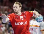 epa10239542 Denmark's Mathias Gidsel in action during the Men's Euro Cup Handball match between Denmark and Spain at the Royal Arena in Copenhagen, Denmark, 12 October 2022. EPA/Liselotte Sabroe DENMARK OUT