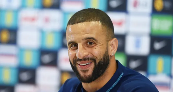 epa10353633 England's Kyle Walker smiles during a press conference in Doha, Qatar, 07 December 2022. England will face France in their FIFA World Cup 2022 quarter final soccer match on 10 December 2022. EPA/NEIL HALL