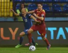 epa10208344 Finland's Teemu Pukki (L) in action against Montenegro's Nikola Vukcevic (R) during the UEFA Nations League soccer match between Montenegro and Finland in Podgorica, Montenegro, 26 September 2022. EPA/BORIS PEJOVIC