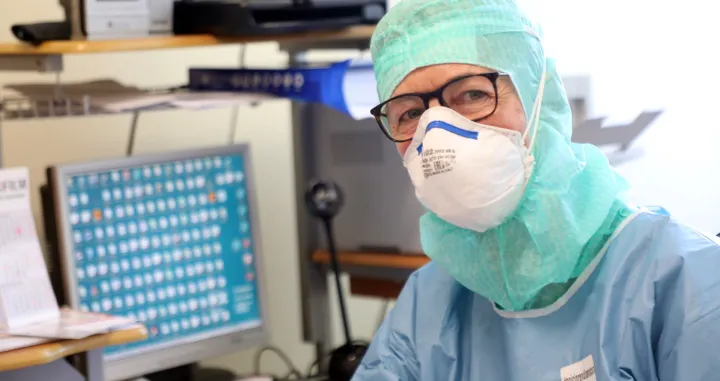 epa08387610 The head of the department of gastroenterology and digestive endoscopy of the Crema hospital, Elisabetta Buscarini, poses for a photo at her workplace near Cremona, Italy, 27 April 2020. Her department was the first to completely transform into a COVID-19 unit. It has now returned to its normal functions after being declared 'coronavirus-free.' There have been 222 deaths at the Crema hospital of patients infected with the pandemic disease caused by the SARS-CoV2 coronavirus. EPA/MATTEO BAZZI/Matteo Bazzi