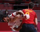 epa09403153 Egypt's Yahia Omar (L) in action against Spain's Raul Rodriguez Entrerrios (R) during the Men's Bronze medal match between Spain and Egypt of the Handball events of the Tokyo 2020 Olympic Games at the Yoyogi National Gymnasium arena in Tokyo, Japan, 07 August 2021. EPA/TATYANA ZENKOVICH