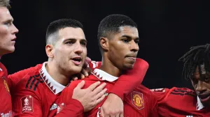 epa10393233 Manchester United's Marcus Rashford (C-R), assisted by teammates, reacts after scoring for 3-1 against Everton during the FA Cup third round match between Manchester United and Everton in Manchester, Britain, 06 January 2023. EPA/Peter Powell EDITORIAL USE ONLY. No use with unauthorized audio, video, data, fixture lists, club/league logos or 'live' services. Online in-match use limited to 120 images, no video emulation. No use in betting, games or single club/league/player publications