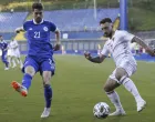 epa09243514 Sead Haksabanovic (R) of Montenegro in action against Damir Sadikovic (L) of Bosnia and Herzegovina during the International Friendly soccer match between Bosnia and Herzegovina and Montenegro in Sarajevo, Bosnia and Herzegovina, 02 June 2021. EPA/FEHIM DEMIR