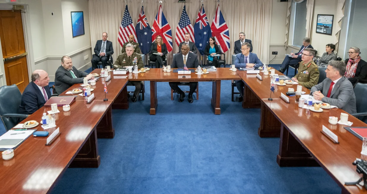 epa10353742 US Secretary of Defense Lloyd Austin (C), with Australian Deputy Prime Minister and Minister of Defense Richard Marles (R) and UK Secretary of State for Defense Ben Wallace (L), delivers remarks during a trilateral meeting at the Pentagon in Arlington, Virginia, USA, 07 December 2022. The three leaders are meeting to discuss the Australia, United Kingdom, United States security pact. EPA/SHAWN THEW/Shawn Thew
