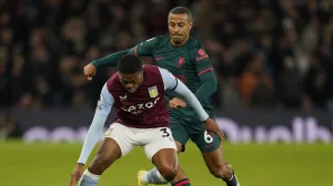 epa10378742 Aston Villa's Leon Bailey (L) in action against Liverpool's Thiago (R) during the English Premier League soccer match between Aston Villa and Liverpool in Birmingham, Britain, 26 December 2022. EPA/Tim Keeton EDITORIAL USE ONLY. No use with unauthorized audio, video, data, fixture lists, club/league logos or 'live' services. Online in-match use limited to 120 images, no video emulation. No use in betting, games or single club/league/player publications
