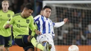 epa10284344 Real Sociedad's midfielder Martin Zubimendi (R) in action against Manchester United's midfielder Casemiro (L) during the UEFA Europa League soccer E soccer match between Real Sociedad and Manchester United held at Reale Arena Stadium, in San Sebastian, northern Spain, 03 November 2022. EPA/Javier Etxezarreta
