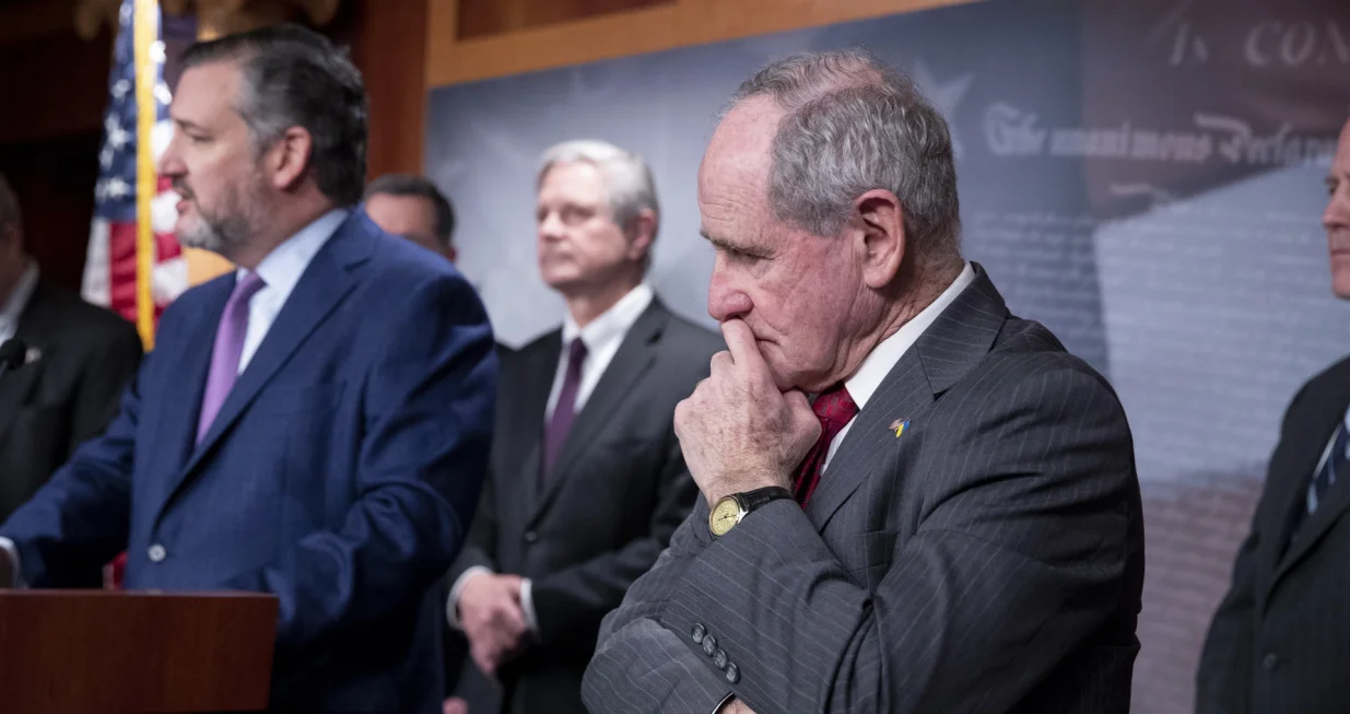 epa09797569 Senate Foreign Relations Committee Ranking Member Jim Risch (R) listens to Republican Senator from Texas Ted Cruz (L) along other Senate Republicans during a news conference on Ukraine, on Capitol Hill in Washington, DC, USA, 02 March 2022. Senate Republicans held a news conference to ask the Biden administration to increase sanctions against Russia and provide more military aid to Ukraine during the ongoing Russian invasion. EPA/MICHAEL REYNOLDS/Michael Reynolds