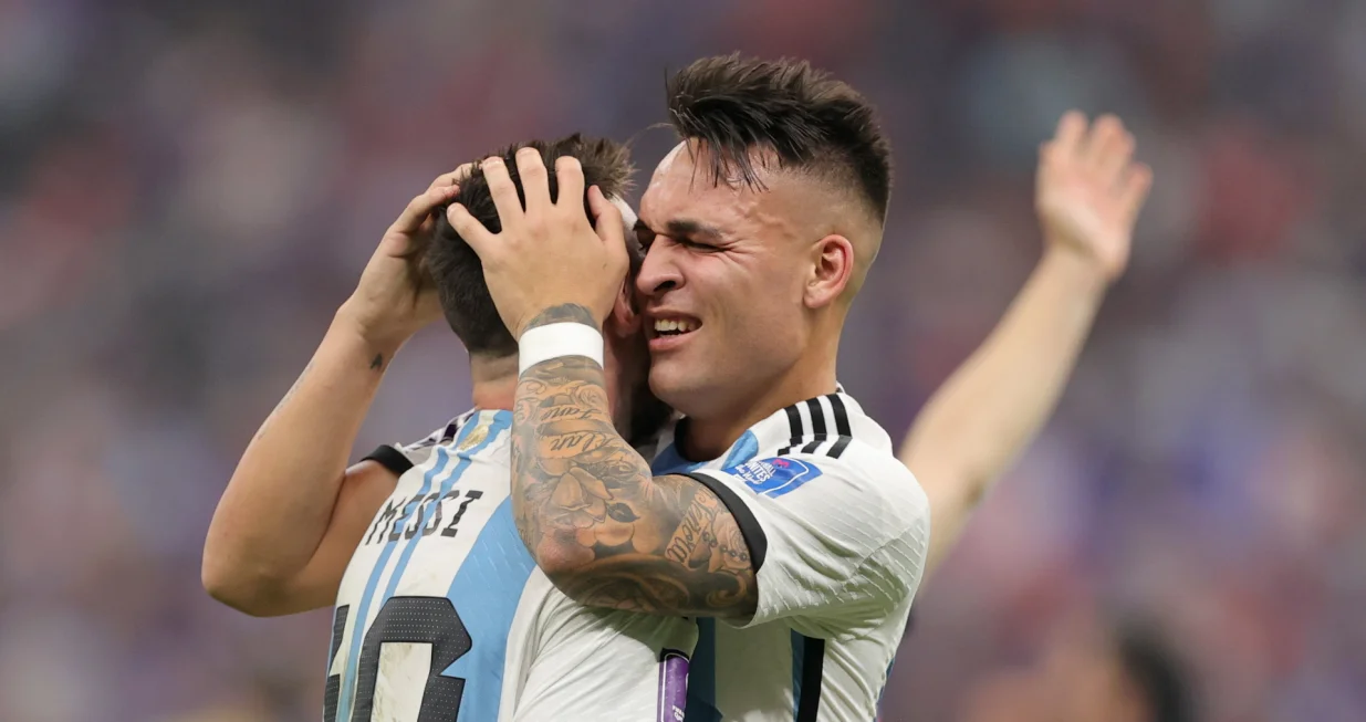 epaselect epa10372843 Lionel Messi (L) of Argentina celebrates with teammate Lautaro Martinez after winning the penalty shoot-out of the FIFA World Cup 2022 Final between Argentina and France at Lusail stadium, Lusail, Qatar, 18 December 2022. EPA/Friedemann Vogel
