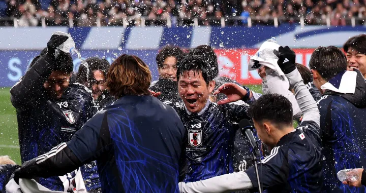 Soccer Football - World Cup - AFC Qualifiers - Third Round - Group C - Japan v Bahrain - Saitama Stadium, Saitama, Japan - March 20, 2025 Japan coach Hajime Moriyasu celebrates after qualifying for the 2026 World Cup REUTERS/Kim Kyung-Hoon