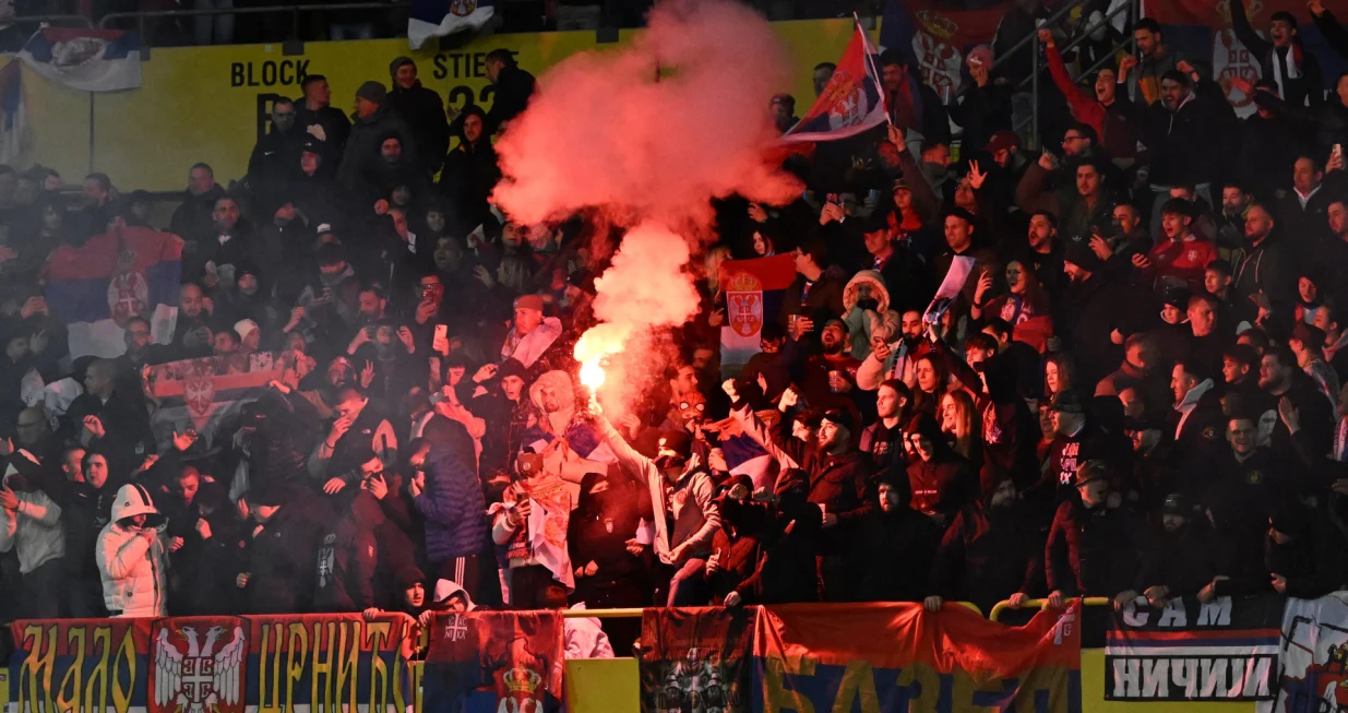 Soccer Football - Nations League - Play-offs - First Leg - Austria v Serbia - Ernst-Happel-Stadion, Vienna, Austria - March 20, 2025 Serbia fans with flares in the stands REUTERS/Elisabeth Mandl