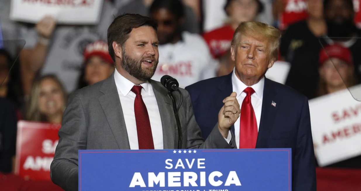 epa10190800 J.D. Vance (L), Republican Nominee for US Senator for Ohio, appears on stage at a Save America rally with former US President Donald Trump (R) at the Covelli Centre in Youngstown, Ohio, USA, 17 September 2022. EPA/DAVID MAXWELL/David Maxwell