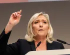 epa10287615 Marine Le Pen, ex-president of France's far right Rassemblement National (RN) party, addresses the 18th RN party Congress in Paris, France, 05 November 2022. The congress chose Eurodeputy Jordan Bardella as new party leader. EPA/TERESA SUAREZ/Teresa Suarez