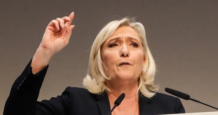 epa10287615 Marine Le Pen, ex-president of France's far right Rassemblement National (RN) party, addresses the 18th RN party Congress in Paris, France, 05 November 2022. The congress chose Eurodeputy Jordan Bardella as new party leader. EPA/TERESA SUAREZ/Teresa Suarez