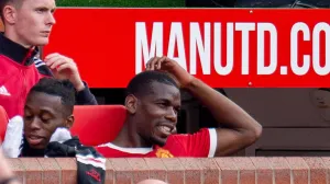 epa09893443 Manchester United's Paul Pogba reacts on the bench during the English Premier League soccer match between Manchester United vs Norwich at Old Trafford, Manchester, Britain, 16 April 2022. EPA/PETER POWELL EDITORIAL USE ONLY. No use with unauthorized audio, video, data, fixture lists, club/league logos or 'live' services. Online in-match use limited to 120 images, no video emulation. No use in betting, games or single club/league/player publications