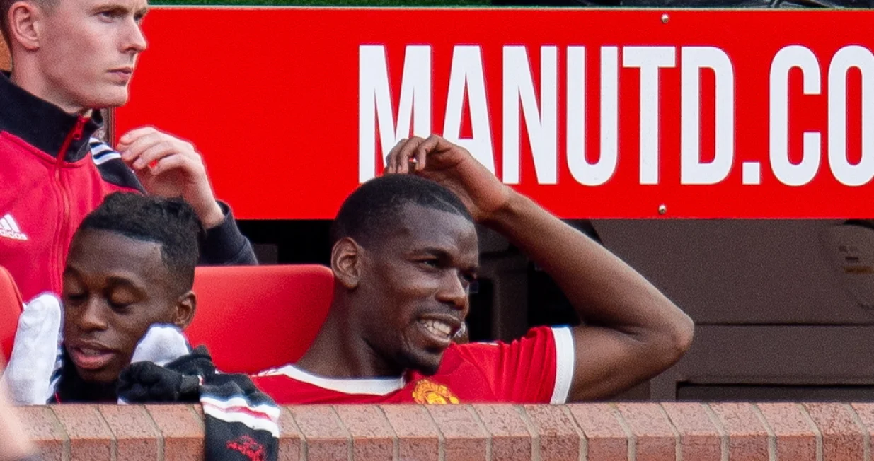 epa09893443 Manchester United's Paul Pogba reacts on the bench during the English Premier League soccer match between Manchester United vs Norwich at Old Trafford, Manchester, Britain, 16 April 2022. EPA/PETER POWELL EDITORIAL USE ONLY. No use with unauthorized audio, video, data, fixture lists, club/league logos or 'live' services. Online in-match use limited to 120 images, no video emulation. No use in betting, games or single club/league/player publications