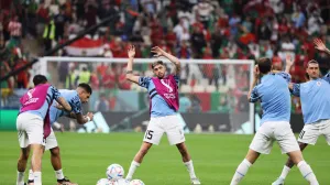 epa10334941 Federico Valverde of Uruguay and teammates warm up ahead of the FIFA World Cup 2022 group H soccer match between Portugal and Uruguay at Lusail Stadium in Lusail, Qatar, 28 November 2022. EPA/Mohamed Messara