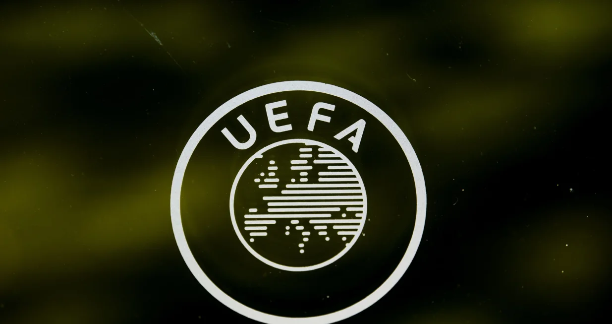 epa09792223 (FILE) - A UEFA logo is pictured through a window prior to the UEFA Europa League 2019/20 Round of 16 draw, at the UEFA Headquarters in Nyon, Switzerland, 28 February 2020 (re-issued on 28 February 2022). The world's football governing body FIFA together with the governing body of European football UEFA announced on 28 February 2022 to have decided together 'that all Russian teams, whether national representative teams or club teams, shall be suspended from participation in both FIFA and UEFA competitions until further notice'. EPA/JEAN-CHRISTOPHE BOTT *** Local Caption *** 55912791