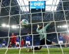 epa08962408 Thomas Muller (R) of Bayern Munich scores their sides first goal past Ralf Fahrmann of FC Schalke 04 during the German Bundesliga soccer match between FC Schalke 04 and FC Bayern Munich at Veltins-Arena in Gelsenkirchen, Germany, 24 January 2021. EPA/LARS BARON/POOL DFL regulations prohibit any use of photographs as image sequences and/or quasi-video.