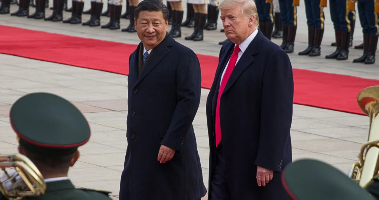 epa08939595 (FILE) US President Donald J. Trump (C-R) and Chinese President Xi Jinping (C-L) review soldiers of the Chinese People's Liberation Army honor guard during a welcome ceremony at the Great Hall of the People in Beijing, China, 09 November 2017. The presidency of Donald Trump, which records two presidential impeachments, will end at noon on 20 January 2021. EPA/ROMAN PILIPEY *** Local Caption *** 53885225/Roman Pilipey
