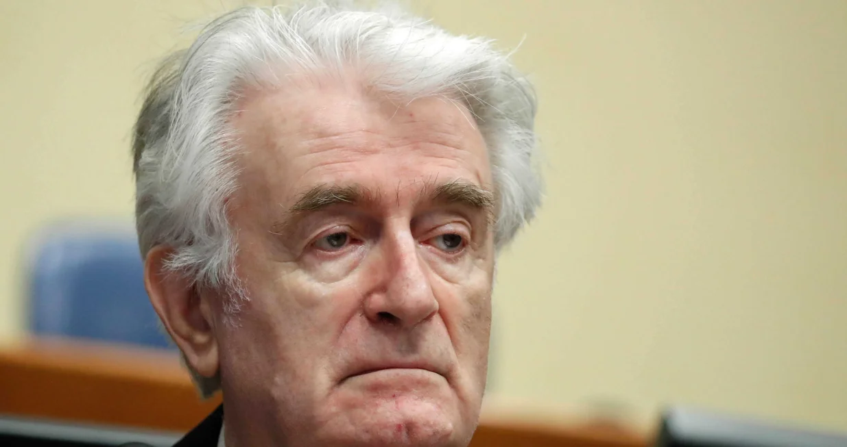 epa08529984 (FILE) - Former Bosnian Serb leader Radovan Karadzic appears in a courtroom before the International Residual Mechanism for Criminal Tribunals (MICT), which handles outstanding war crimes cases for the Balkans and Rwanda, in The Hague, The Netherlands, 24 April 2018 (reissued 06 July 2020). A quarter of a century ago, the world witnessed the worst mass murder on European soil since World War II. Some 7,000-8,000 Bosniaks were slaughtered and 20,000 civilians were forcibly displaced in an act of ethnic cleansing perpetrated in the small eastern Bosnian village of Srebrenica, whose name will forever be linked to the infamous 1995 massacre. Today, 25 years after the massacre, the memory of its victims is kept alive by several institutions, such as the Museum of Crimes Against Humanity and Genocide in Sarajevo or a permanent exhibit at the 'Memorial Center Srebrenica-Potocari' that now occupies the former headquarters of the Dutch UNPROFOR Battalion. EPA/YVES HERMAN/POOL ATTENTION: This Image is part of a PHOTO SET/Yves Herman/Pool