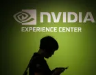 epa08669640 (FILE) - A visitor walks past the Nvidia company logo during a news conference ahead of the COMPUTEX, the largest computer show in Asia, in Taipei, Taiwan, 30 May 2016 (reissued 15 September 2020). US tech giant Nvidia on 13 September 2020 announced it will purchase chip designer Arms for 40 billion US dollar from SoftBank. EPA/RITCHIE B. TONGO *** Local Caption *** 52789390/Ritchie B. Tongo