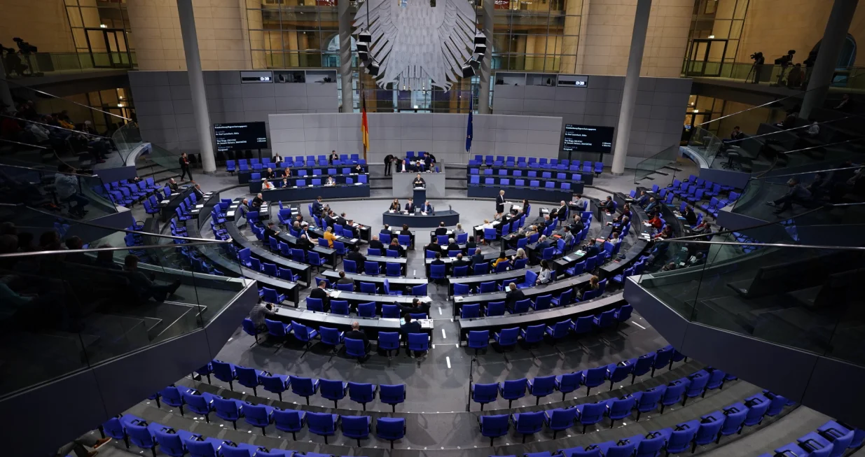 epa10343935 German Health Minister Karl Lauterbach (C, background) delivers a speech during a session of the German parliament Bundestag in Berlin, Germany, 02 December 2022. Among other topics, the members of German parliament are about to discuss a Hospital Care Relief Act (Krankenhauspflegeentlastungsgesetz). EPA/CLEMENS BILAN/Clemens Bilan
