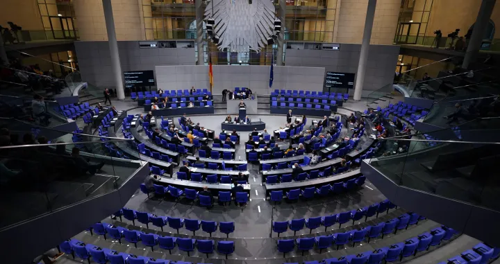 epa10343935 German Health Minister Karl Lauterbach (C, background) delivers a speech during a session of the German parliament Bundestag in Berlin, Germany, 02 December 2022. Among other topics, the members of German parliament are about to discuss a Hospital Care Relief Act (Krankenhauspflegeentlastungsgesetz). EPA/CLEMENS BILAN/Clemens Bilan