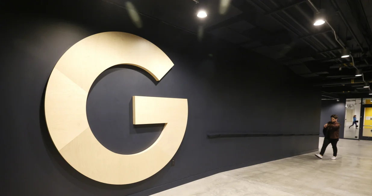 epa09952089 Google logo in the hallway during a media tour in Mountain View, California, USA, 16 May 2022. Google announced on 16 May the opening of its new Bay View campus in Silicon Valley, representing the company's first time developing its own major campus and the largest to pursue multiple green building certifications. The Bay View campus was designed by architects Bjarke Ingels Group (BIG) and Heatherwick Studio, as well as Google's design and engineering teams and spans 42 acres adjacent to the open space, two office buildings, and 1,00-person event center, and 240 short-term employee accommodations units. The campus incorporates biophilic design principles, including greenery, natural daylight and views outside from every desk to improve the health and wellbeing of those inside the building. The new building is to operate every hour of every day on carbon-free energy by 2030, the first-of-its-kind dragonscale solar skin, as well as nerby wind farms, will power Bay View on carbon-free energy 90 percent of the time. Bay View is 100 percent electric where even the kitchens are electric to decrease carbon emissions. To help deliver on its commitment to replenish 120 percent of the water it comsumes by 2023, the site is net water-positive with all non-potable water demands being met using the recycled water it generates on site. A series of above-ground ponds gather rainwater, combine with building wastewater treatment systems, together serve as a water source for cooling towers, flushing toilets, and landscape irrigation. EPA/JOHN G. MABANGLO/John G. Mabanglo