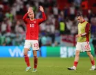 epa10337513 Welsh players Aaron Ramsey (L) and Gareth Bale (R) react after the FIFA World Cup 2022 group B soccer match between Wales and England at Ahmad bin Ali Stadium in Doha, Qatar, 29 November 2022. EPA/Friedemann Vogel