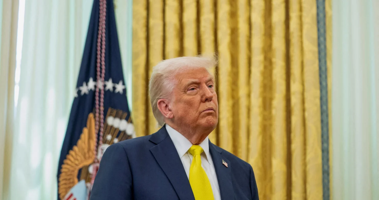 FILE PHOTO: U.S. President Donald Trump listens to remarks during a swearing-in ceremony for Administrator of the Centers for Medicare and Medicaid Services Mehmet Oz in the Oval Office in Washington, D.C., U.S., April 18, 2025. REUTERS/Nathan Howard/File Photo/Nathan Howard