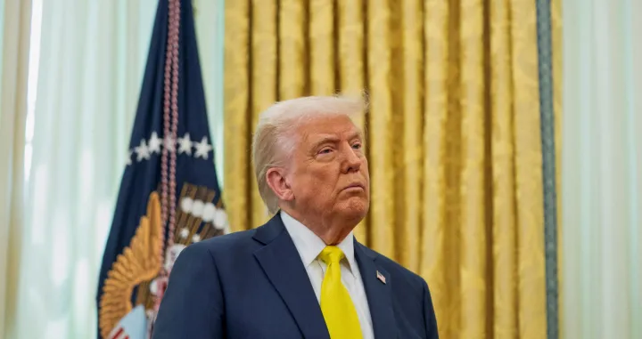 FILE PHOTO: U.S. President Donald Trump listens to remarks during a swearing-in ceremony for Administrator of the Centers for Medicare and Medicaid Services Mehmet Oz in the Oval Office in Washington, D.C., U.S., April 18, 2025. REUTERS/Nathan Howard/File Photo/Nathan Howard