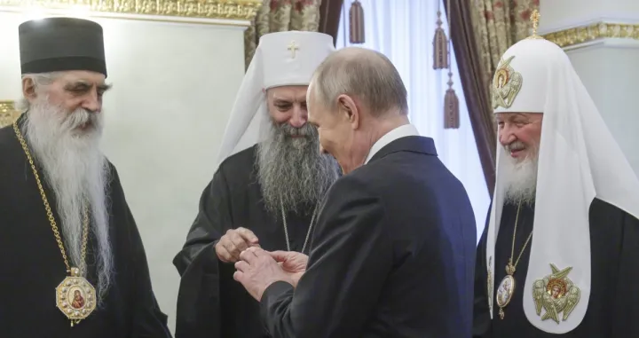 Vladimir Putin i patrijarh Porfirije/Agencije