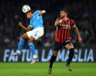 Soccer Football - Serie A - Napoli v AC Milan - Stadio Diego Armando Maradona, Naples, Italy - March 30, 2025 Napoli's David Neres in action with AC Milan's Kyle Walker REUTERS/Ciro De Luca