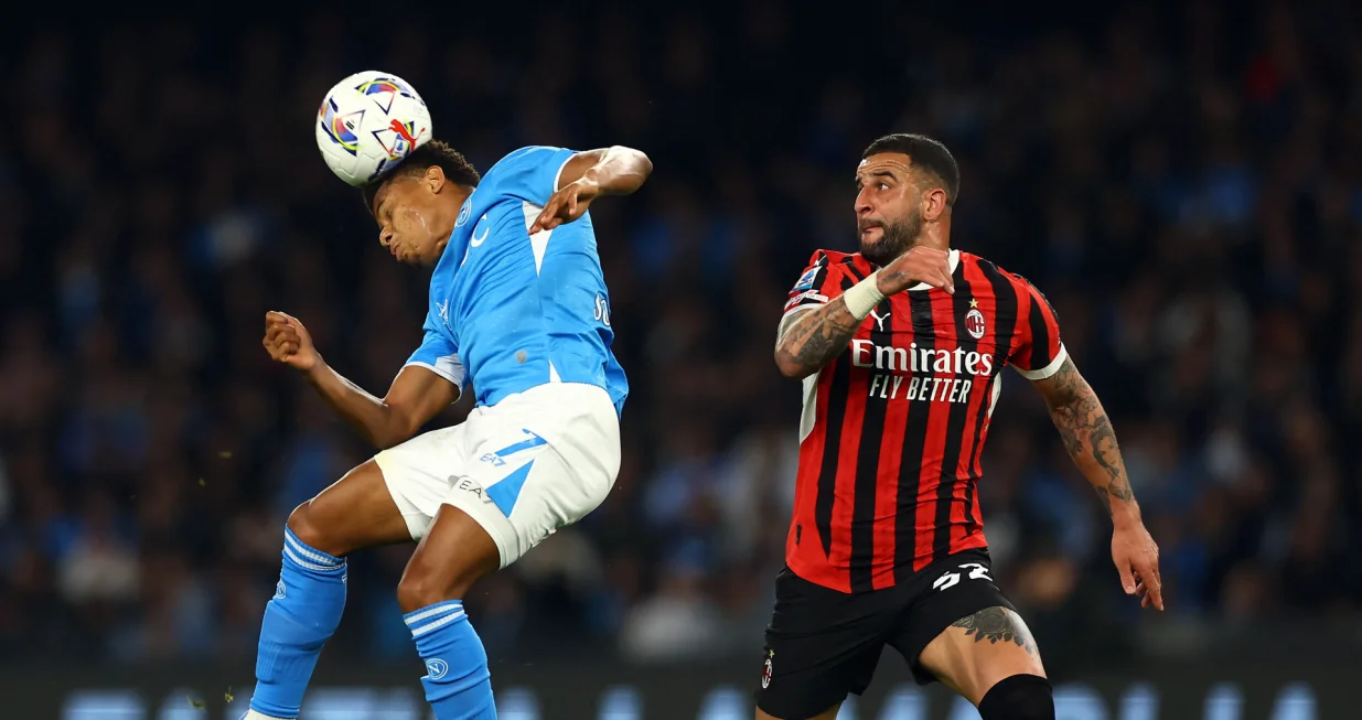 Soccer Football - Serie A - Napoli v AC Milan - Stadio Diego Armando Maradona, Naples, Italy - March 30, 2025 Napoli's David Neres in action with AC Milan's Kyle Walker REUTERS/Ciro De Luca