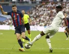 epa10247599 FC Barcelona's Robert Lewandowski (L) in action against Real Madrid's Aurelien Tchouameni (R) during El Clasico, the Spanish LaLiga soccer match between Real Madrid and FC Barcelona in Madrid, Spain, 16 October 2022. EPA/Rodrigo Jimenez