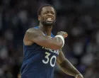 Apr 25, 2025; Minneapolis, Minnesota, USA; Minnesota Timberwolves forward Julius Randle (30) reacts after a foul is called against the Los Angeles Lakers in the first half during game three of first round for the 2024 NBA Playoffs at Target Center. Mandatory Credit: Jesse Johnson-Imagn Images