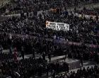 People hold a banner that says "Goodbye Father, Teacher and Poet", ahead of the funeral Mass of Pope Francis in St. Peter's Square at the Vatican, April 26, 2025. REUTERS/Nathan Howard/Nathan Howard