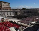 Faithful gather during the funeral Mass in St. Peter's Square at the Vatican, April 26, 2025. REUTERS/Nathan Howard/Nathan Howard