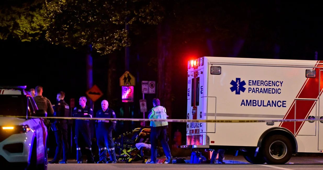 An ambulance is parked at the site of the Lapu Lapu day block party, where a vehicle drove into a crowd killing several people in Vancouver, British Columbia, Canada April 26, 2025. REUTERS/Jennifer Gauthier/Jennifer Gauthier