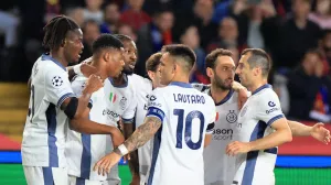 Soccer Football - Champions League - Semi Final - First Leg - FC Barcelona v Inter Milan - Estadi Olimpic Lluis Companys, Barcelona, Spain - April 30, 2025 Inter Milan's Denzel Dumfries celebrates scoring their second goal with teammates REUTERS/Nacho Doce