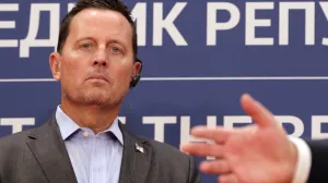 epa08688380 Advisor to the USA President on Kosovo-Serbia, Richard Grenell looks on during a joint press conference with Serbian President Aleksandar Vucic (not pictured) following their meeting in Belgrade, Serbia, 22 September 2020. Grenell is visiting Serbia for talks with business leaders and government officials after signing an agreement between Serbia and Kosovo for economic relations at the White House on 04 September. EPA/ANDREJ CUKIC/Andrej Cukic